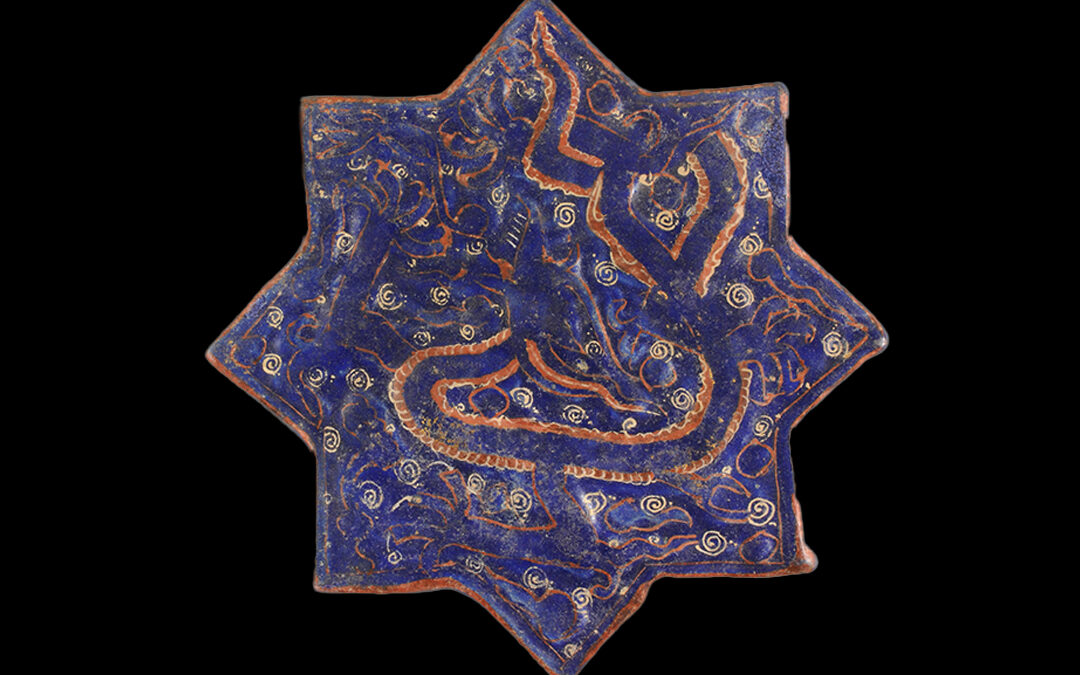 Mattonella a stella con drago a rilievo