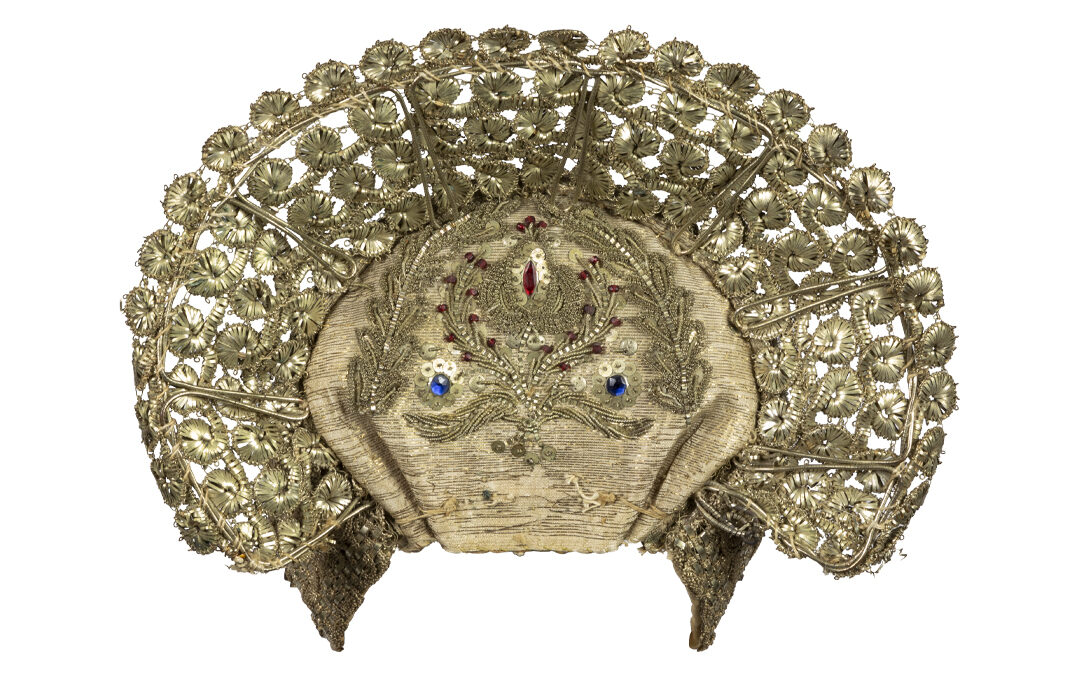 Woman’s cap with silver ornaments and ribbon